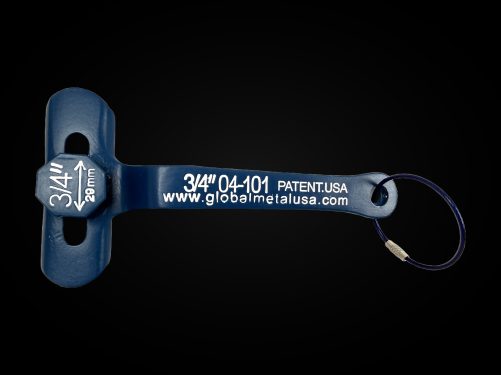 3/4" and 1/2" brass ball valve wrench, engraved face with key ring on a black background, item 04-101